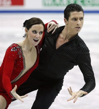 Tessa Virtue from London, Ont., and Scott Moir from Ilderton, Ont. perform their compulsory dance in the ice dance competition at the World Figure Skating Championships in Goteborg, Sweden, Tuesday, March 18, 2008. THE CANADIAN PRESS/Paul Chiasson