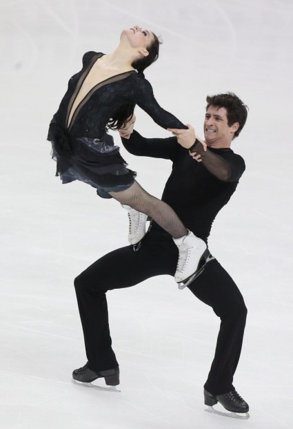Canadian ice dancers Tessa Virtue and Scott Moir perform their free dance to win the ISU Grand Prix Rostelekom Cup event, in Moscow, Russia, on Saturday, Nov. 10, 2012. (AP Photo/Ivan Sekretarev)