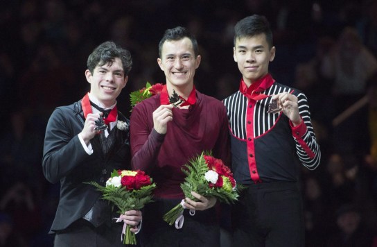 Senior men gold medallist Patrick Chan, centre, silver medallist Keegan Messing, left, and bronze medallist Nam Nguyen show their medals following the 2018 Canadian National Skating Championships