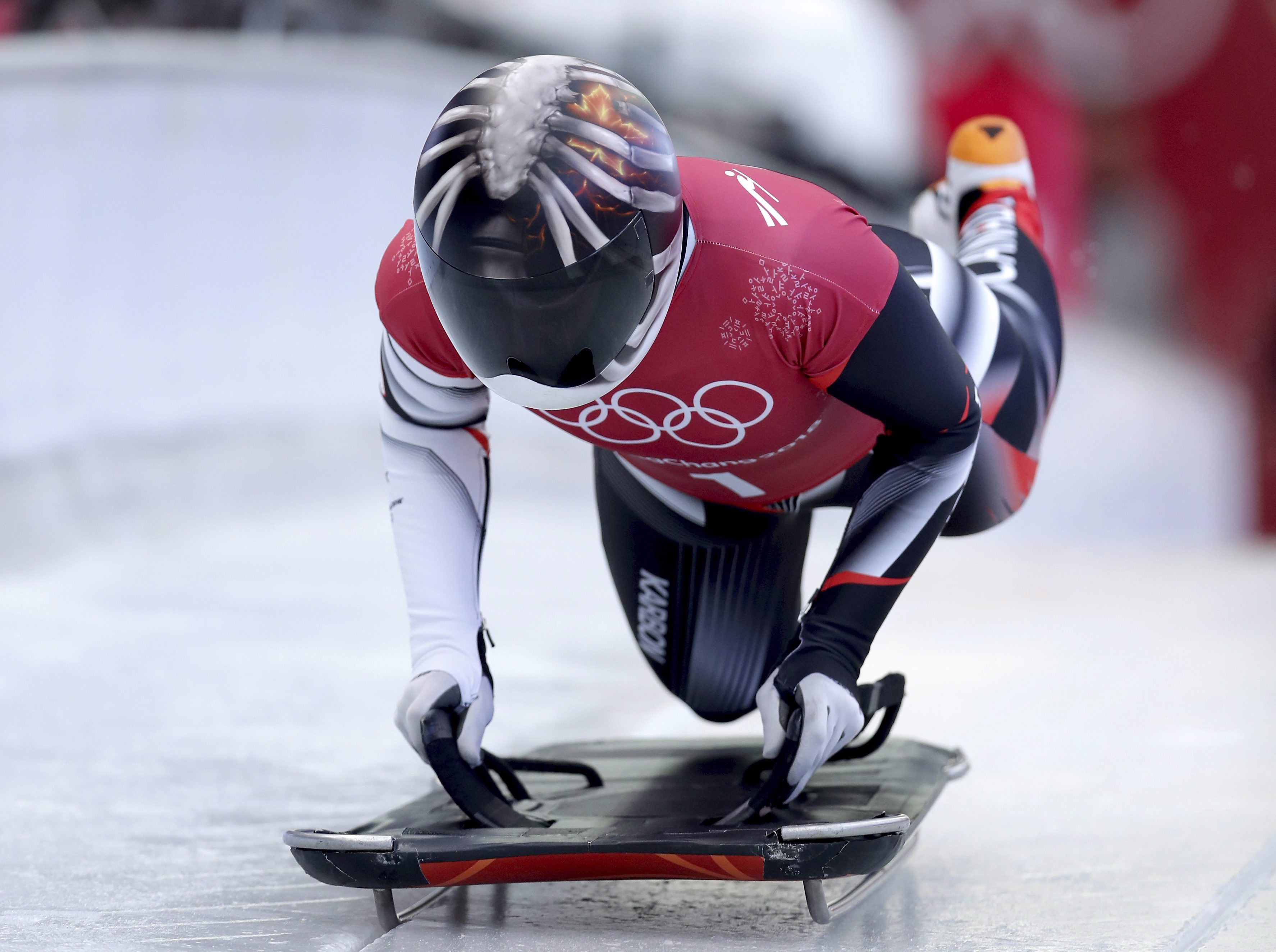 What Do Team Canadas Skeleton Racers Have On Their Helmets Team