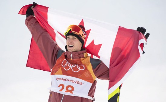 Alex Beaulieu-Marchand, of Canada, celebrates his bronze medal following the men's ski slopestyle final at Phoenix Snow Park during the 2018 Olympic Winter Games, in Pyeongchang, South Korea, Sunday, February 18, 2018. THE CANADIAN PRESS/Jonathan Hayward