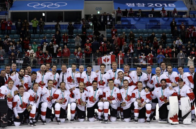 Canada hockey team celebrate with their bronze medals after beating the Czech Republic in the men's bronze medal hockey game at the 2018 Winter Olympics in Gangneung, South Korea, Saturday, Feb. 24, 2018. (AP Photo/Matt Slocum)