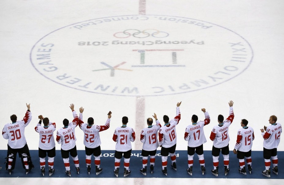 Canada hockey team celebrate with their bronze medals after beating the Czech Republic in the men's bronze medal hockey game at the 2018 Winter Olympics in Gangneung, South Korea, Saturday, Feb. 24, 2018. (AP Photo/Charlie Riedel)