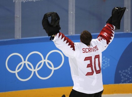 Pyeongchang Olympics Ice Hockey Men Ben Scrivens (30), of Canada, celebrates after the men's bronze medal hockey game against the Czech Republic at the 2018 Winter Olympics in Gangneung, South Korea, Saturday, Feb. 24, 2018. Canada won 6-4. (AP Photo/Julio Cortez)