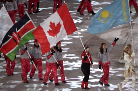OLY Closing Ceremony 20180225 Canadian short-track speed skater Kim Boutin leads team Canada into the Olympic stadium carrying the Canadian flag during the closing ceremonies at the 2018 Pyeongchang Olympic Winter Games in Pyeongchang, South Korea, on Sunday, February 25, 2018. THE CANADIAN PRESS/Paul Chiasson