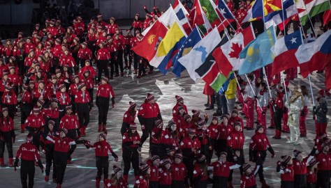 OLY Closing Ceremony 20180225 Canadian short-track speed skater Kim Boutin leads team Canada into the Olympic stadium Canadian athletes walk into the Olympic stadium during the closing ceremonies at the 2018 Pyeongchang Olympic Winter Games in Pyeongchang, South Korea, on Sunday, February 25, 2018. THE CANADIAN PRESS/Nathan Denettethe Canadian flag during the closing ceremonies at the 2018 Pyeongchang Olympic Winter Games in Pyeongchang, South Korea, on Sunday, February 25, 2018. THE CANADIAN PRESS/Nathan Denette