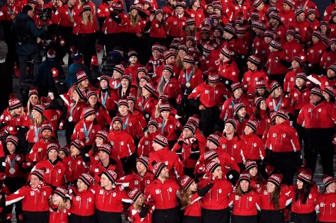 Canadian athletes enter the stadium during the closing ceremonies at the 2018 Pyeongchang Olympic Winter Games in Pyeongchang, South Korea, while drones design the Games' mascot in the sky on Sunday, February 25, 2018. THE CANADIAN PRESS/Paul Chiasson