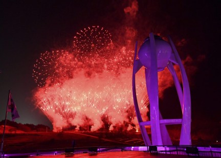 Fireworks explode near the Olympic cauldron at the end of the closing ceremony of the 2018 Winter Olympics in Pyeongchang, South Korea, Sunday, Feb. 25, 2018. (Florien Choblet/Pool Photo via AP)
