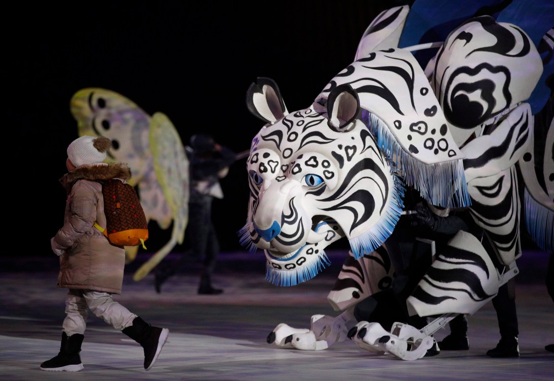 A white tiger character at the 2018 Olympic Opening Ceremony