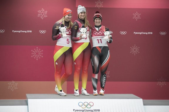 DAJ_20180213_TEAMCANADA_0011727 Team Canada's Alex Gough poses with Natalie Geinsenberger(L) and Dajan Eitberger(C) after winning Bronze