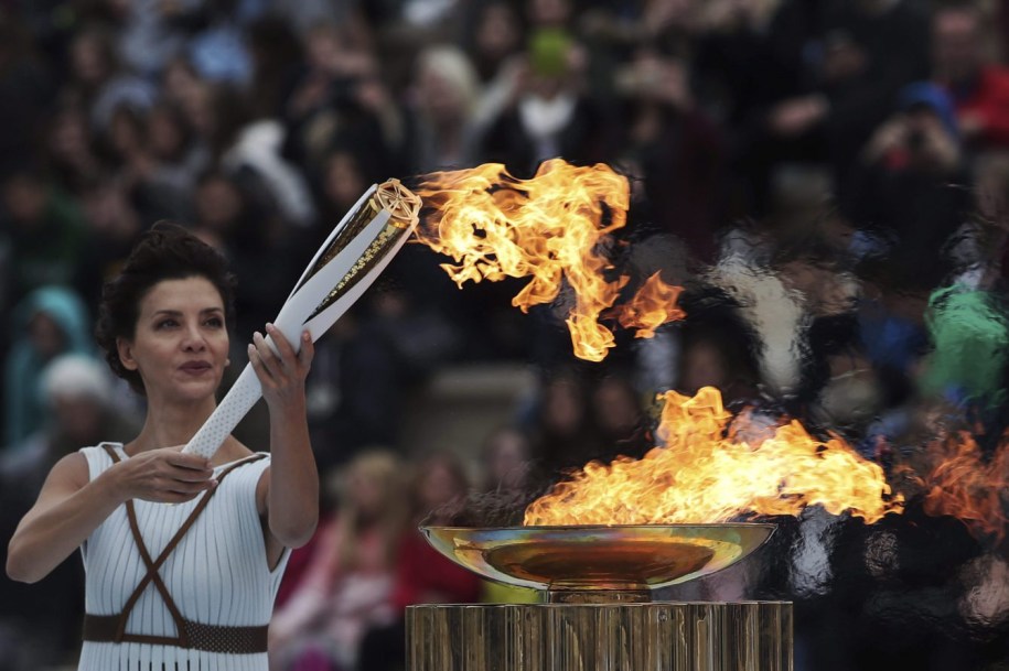 Actress playing the role of high priestess lights the Pyeongchang Olympic torch