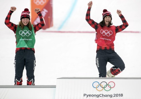 Canada's Kelsey Serwa, red bib, celebrates with fellow Canadian Brittany Phelan after placing first and second in ski cross at the PyeongChang 2018 Olympic Winter Games in Korea, Friday, February 23, 2018. THE CANADIAN PRESS/HO - COC – Jason Ransom