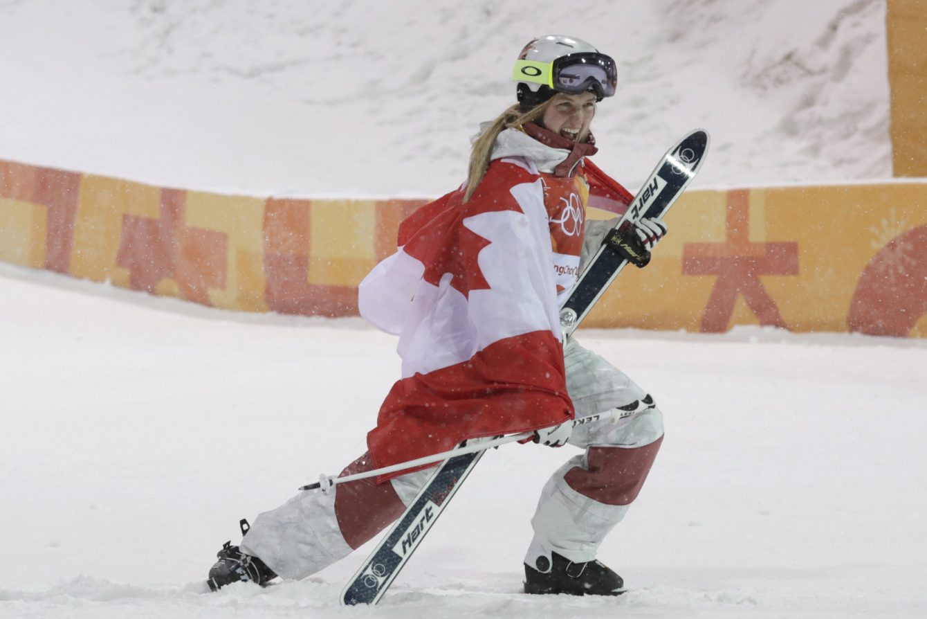 Justine Dufour-Lapointe does her signature pose, after claiming moguls silver at PyeongChang 2018.