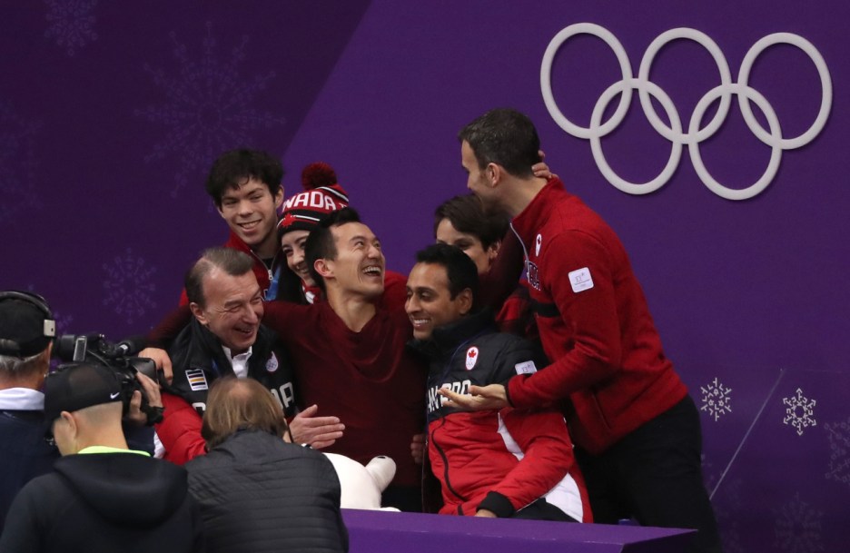 Patrick Chan performs his routine celebrates in the kiss and cry at PyeongChang 2018