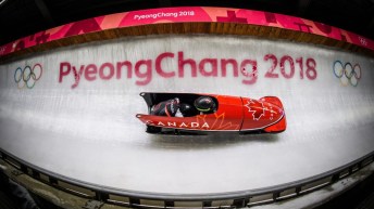 Humphries racing on the track in a bobsleigh