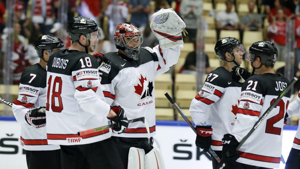 Team Canada defeats Russia in OT, advances to semis at men's hockey