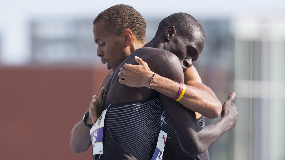 McBride embracing teammate Marco Arop