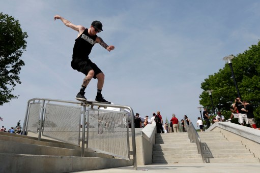 Andrew Ryan Walker skateboarding on a handrail