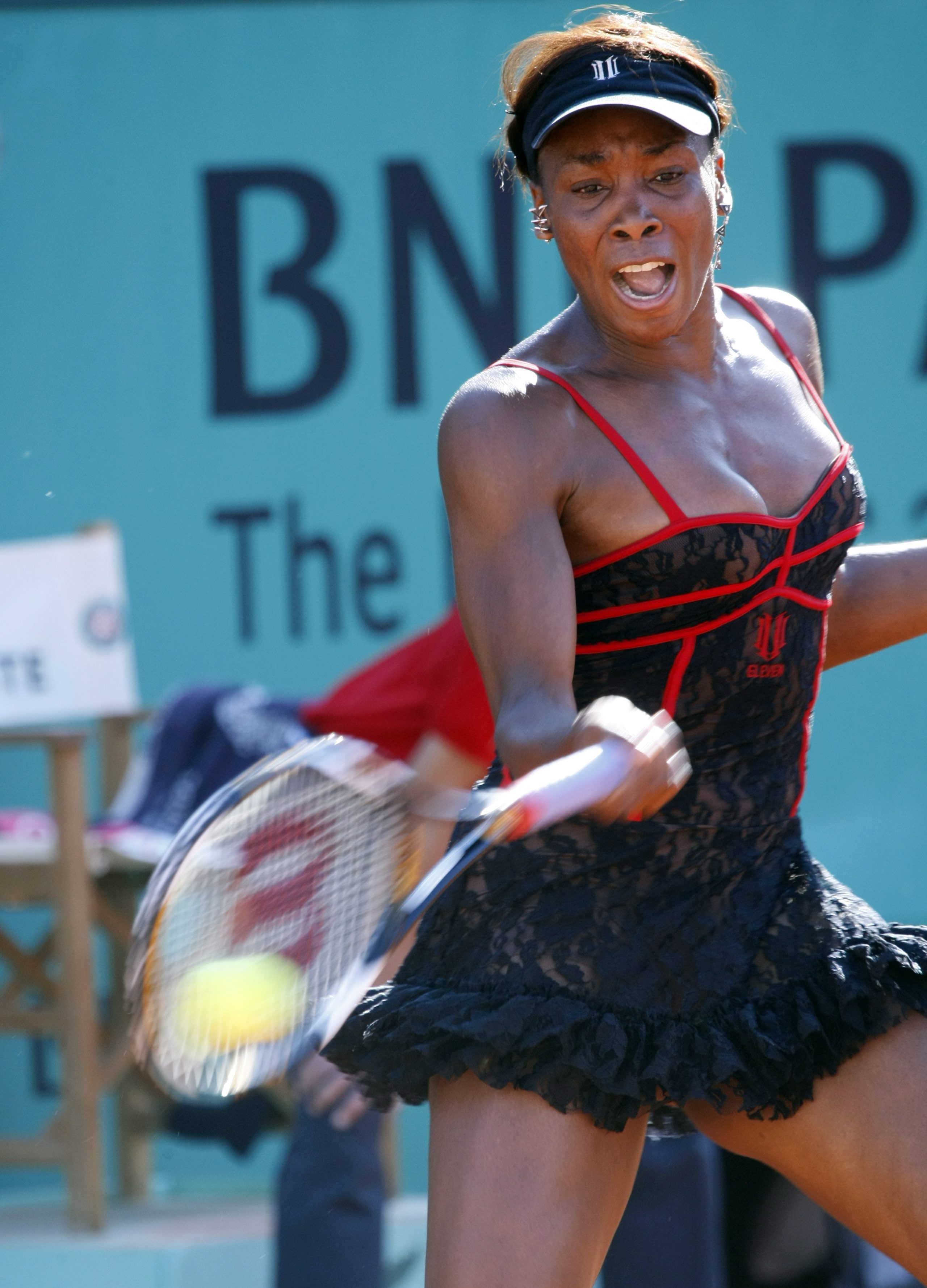 Venus Williams returns the ball