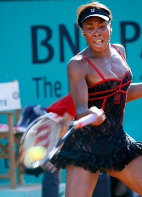 Venus Williams returns the ball