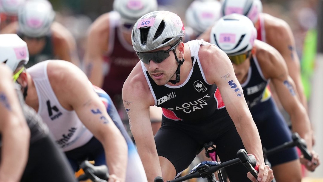 Charles Paquet rides his bike