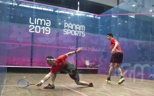 Two squash players competing