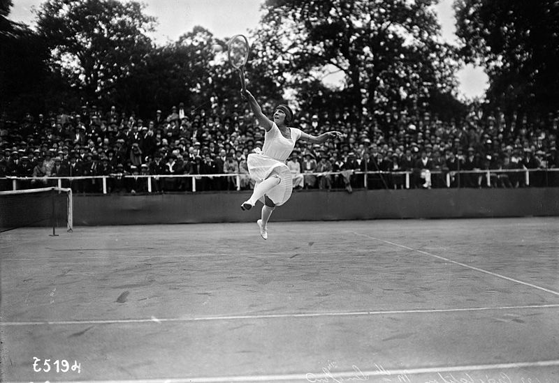 Suzanne Lenglen jumping during her photoshoot in 1922