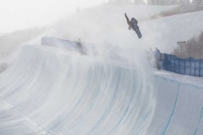 Braeden Adams in the air on his snowboard