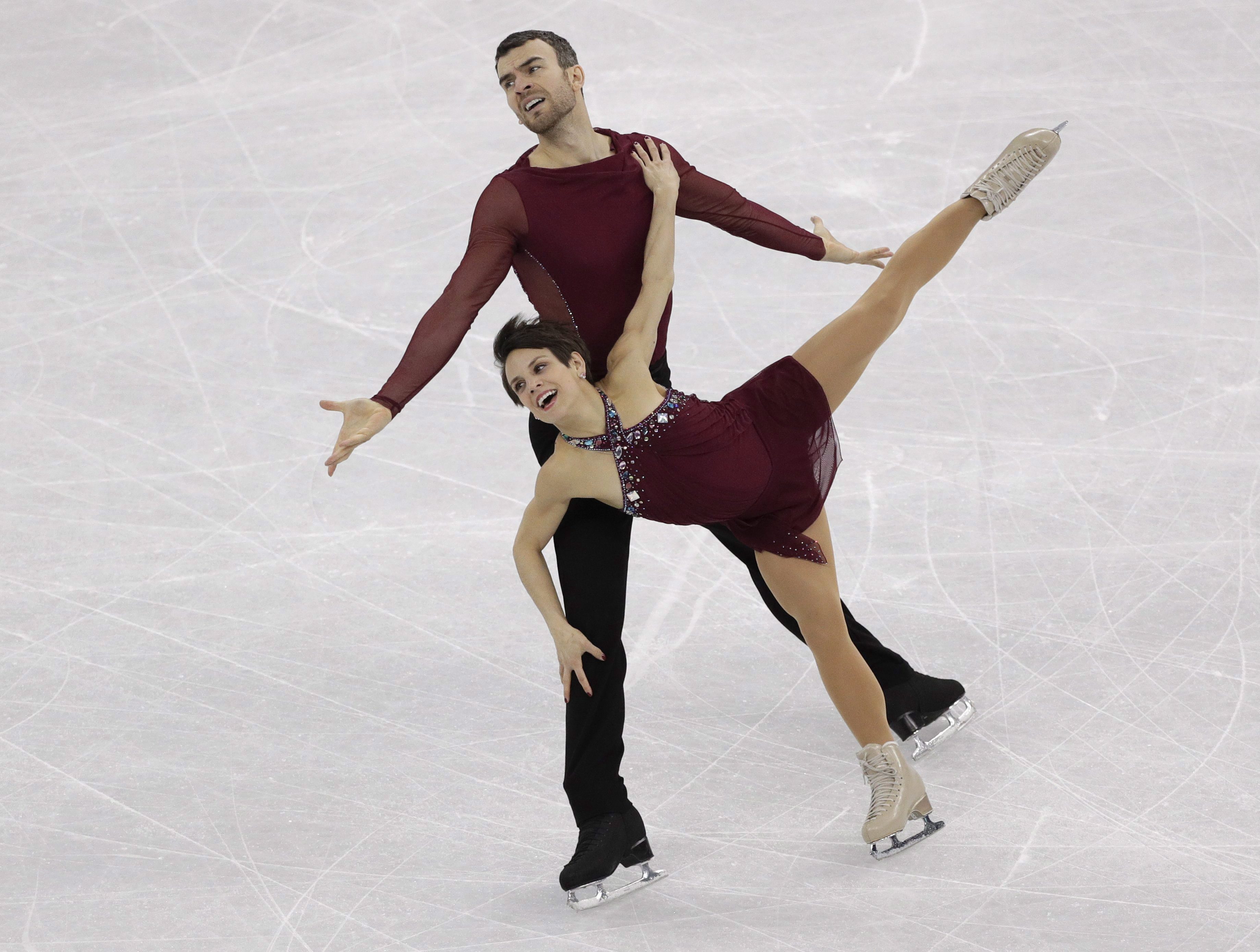 Meagan Duhamel and Eric Radford performing at 2018 Winter Olympics.