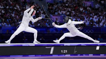 Team Canada's Jessica Guo competes in the Fencing Women's Foil Team bronze medal match against Japan during the 2024 Paris Olympics Games in France on Thursday, August 1, 2024.