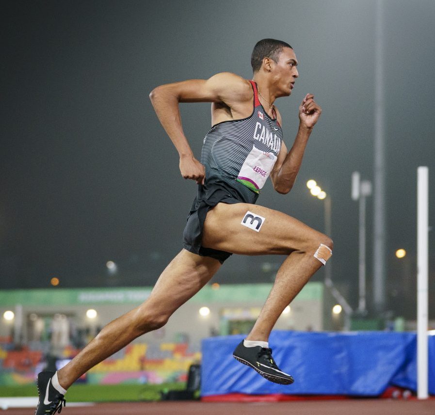 Pierce Lepage of Canada competes in the 400m race during the decathlon