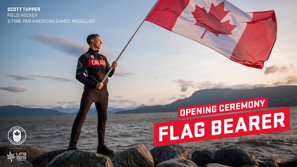 Graphic Scott Tupper holds a Canadian Flag