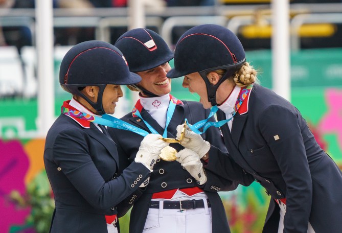 Jill Irving, Lindsay Kellock and Tina Irwin hold medals together