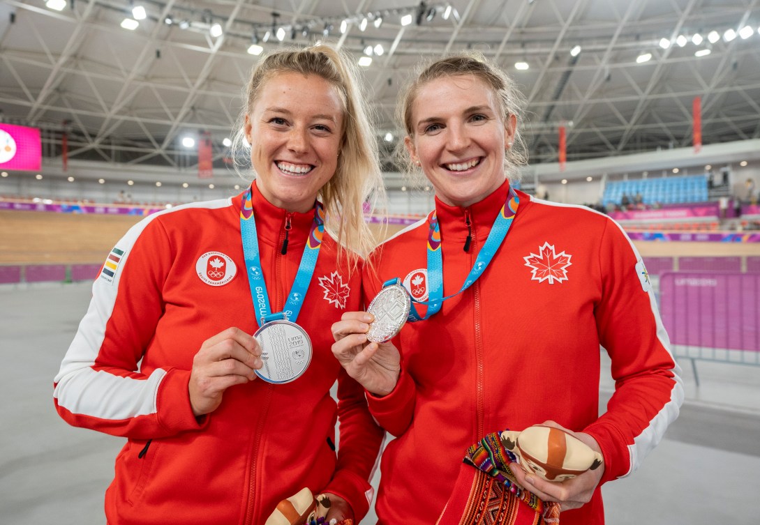 Kelsey Mitchell and Amelia Walsh with their silver medals in the women's team pursuit