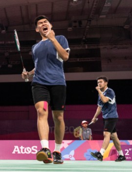 team-canada-badminton badminton player celebrates