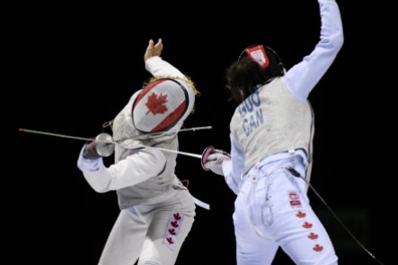 team-canada-guo two fencers compete