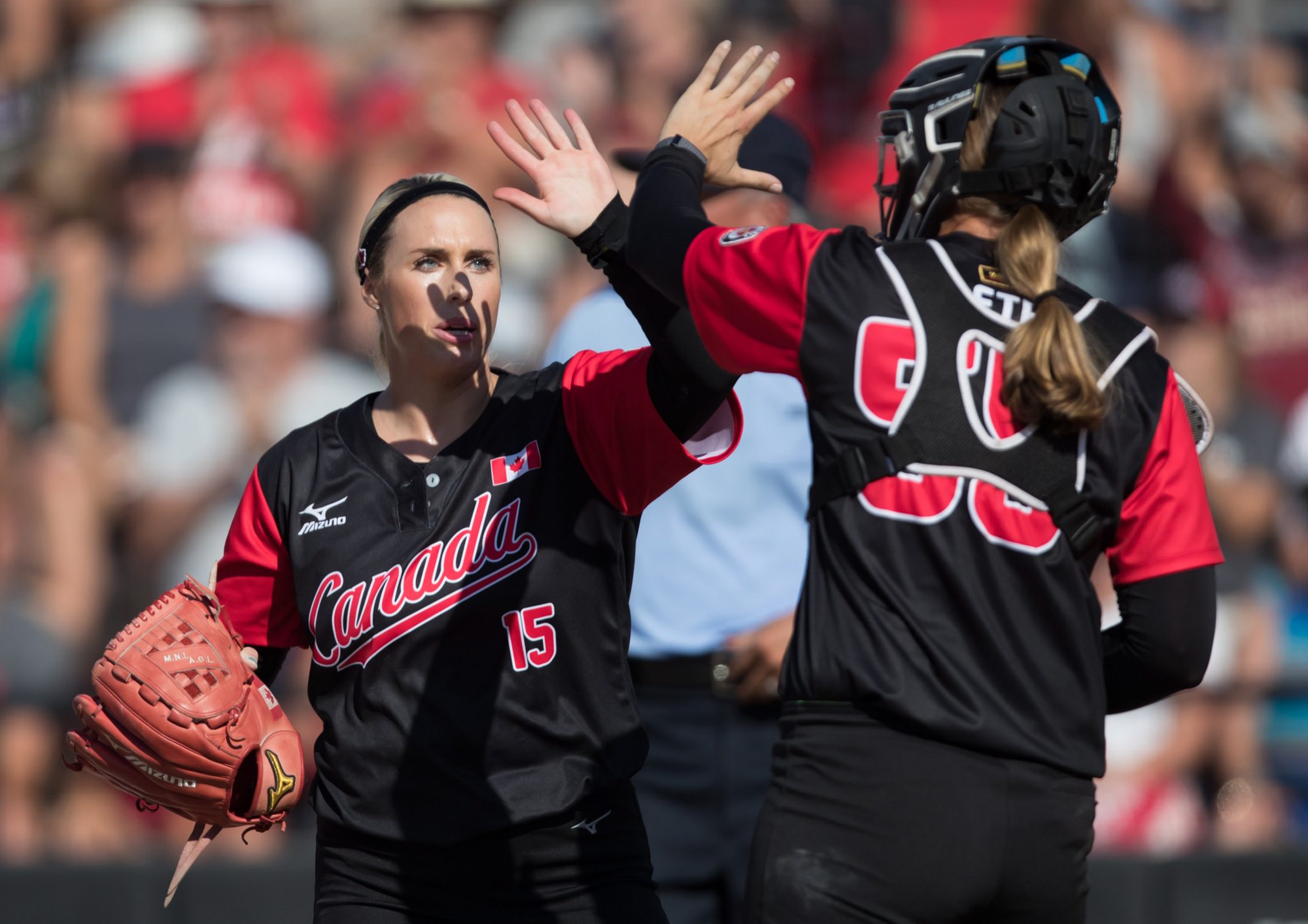 Danielle Lawrie and Kaleigh Rafter high five