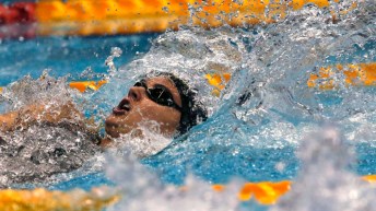 Canada's Kylie Masse swims on her way to winning the women's 100m backstroke final during the Pan Pacific swimming championships in Tokyo