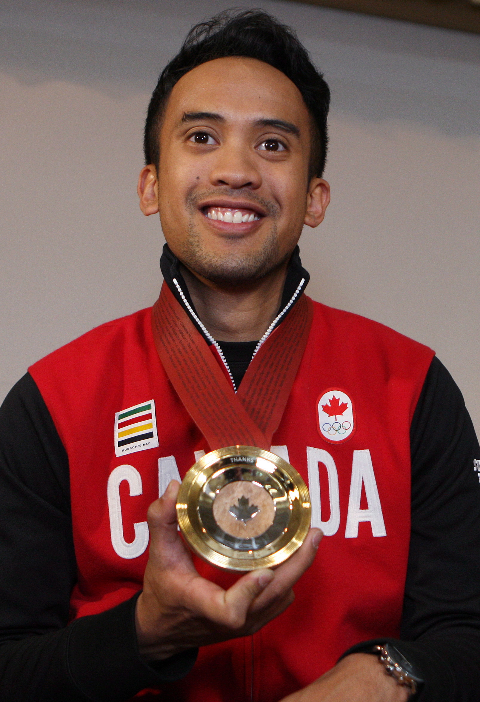 Gilmore Junio poses with his medal