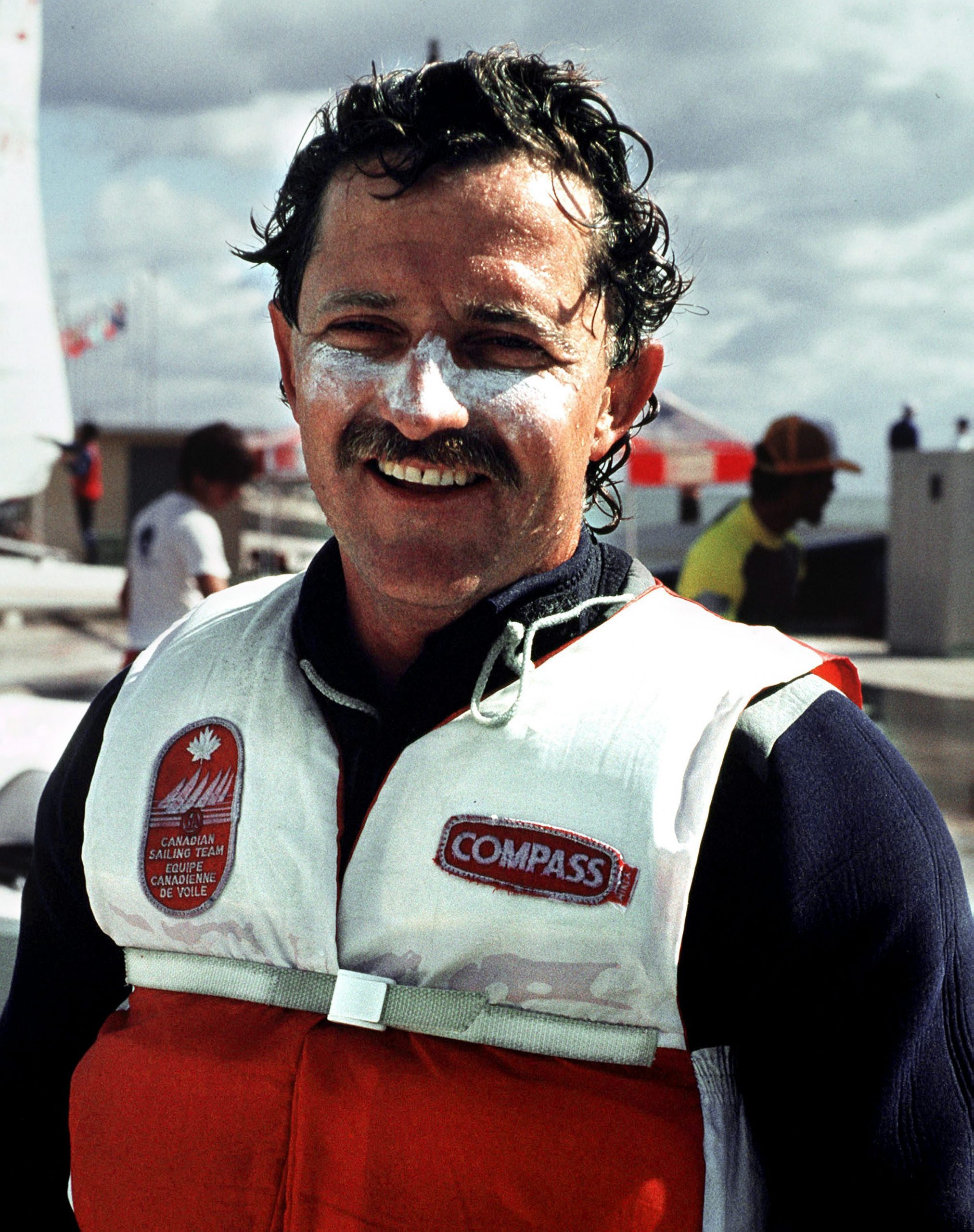 Lawrence Lemieux smiling while wearing his life jacket