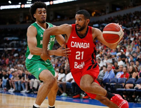 Thomas Scrubb dribbles past defender