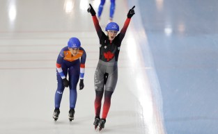 Canada's Ivanie Blondin, bottom right, celebrates after winning the women's mass start race as she followed by second placed Irene Schouten, of the Netherlands, during the speed skating World Cup at the Minsk ice arena in Minsk, Belarus, Sunday, Nov. 17, 2019. (AP Photo/Sergei Grits)