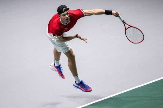 Denis Shapovalov serving