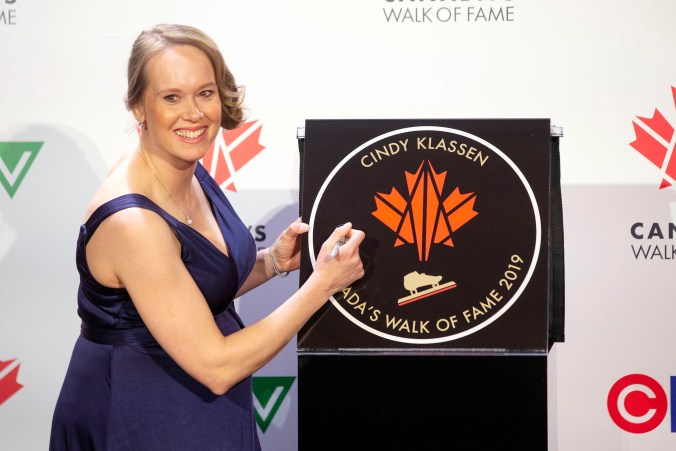 Olympian Cindy Klassen is pictured with her star as she is inducted into Canada's Walk of Fame.