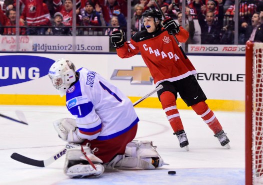 Team Canada's Sam Reinhart celebrates a goal