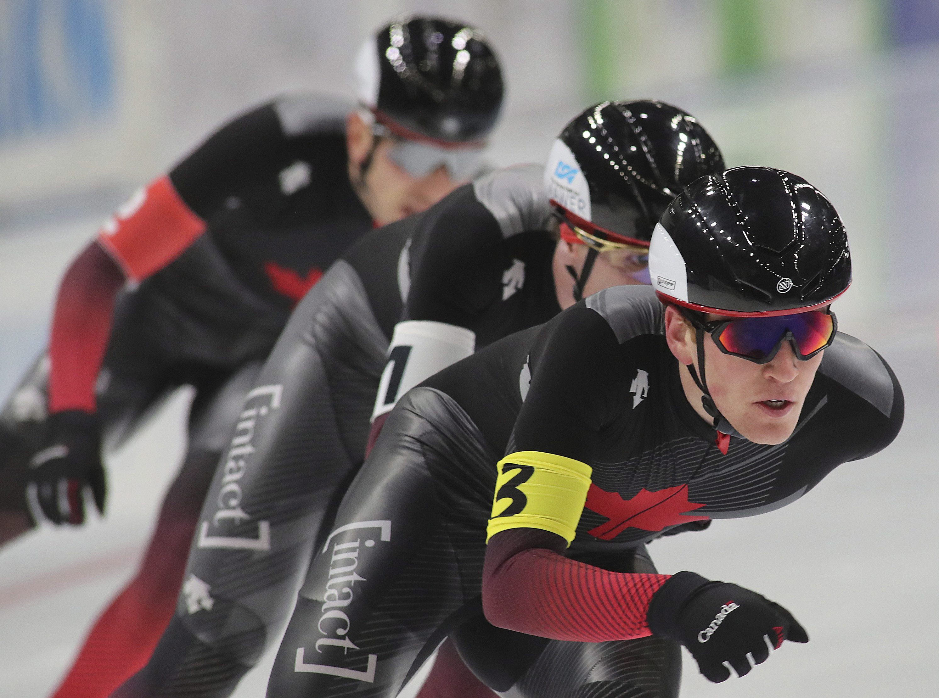 Canada's team in action during the men's team race of ISU Speedskating World Cup in Tomaszow Mazowiecki, Poland, Sunday , Nov. 24, 2019. (AP Photo/Marian Zubrzycki)