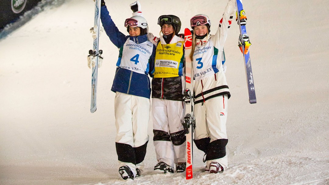 Justine Dufour-Lapointe (right) poses with winner Perrine Laffont (centre) and silver medallist Jakara Anthony.