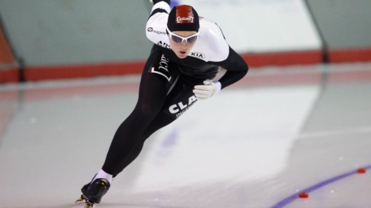 Danielle Wotherspoon Gregg racing in women's speed skating at 2014 Sochi Olympic Games