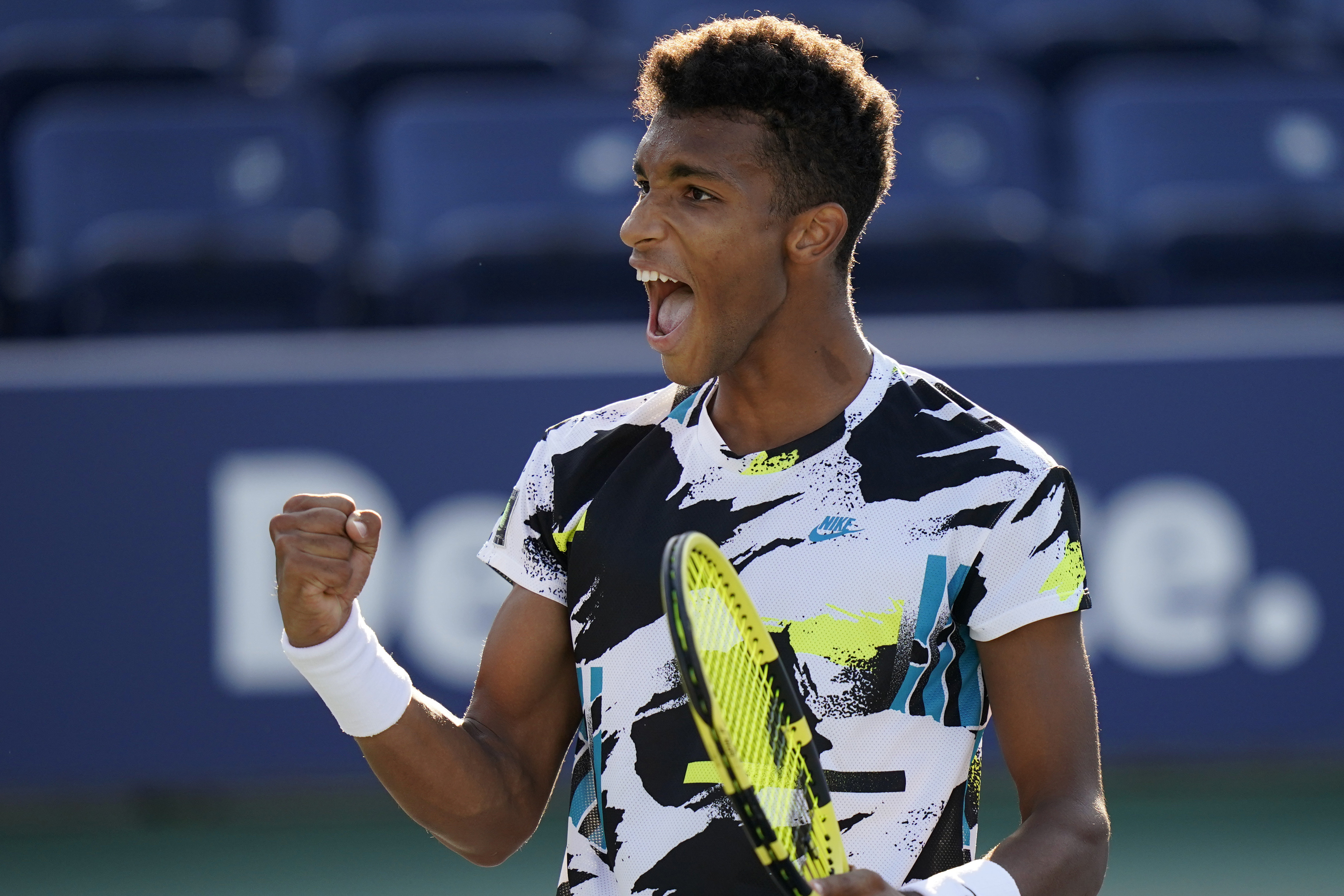 Felix Auger-Aliassime, of Canada, celebrates after winning a match against Corentin Moutet, of France, during the third round of the US Open tennis championships, Saturday, Sept. 5, 2020, in New York. (AP Photo/Frank Franklin II)