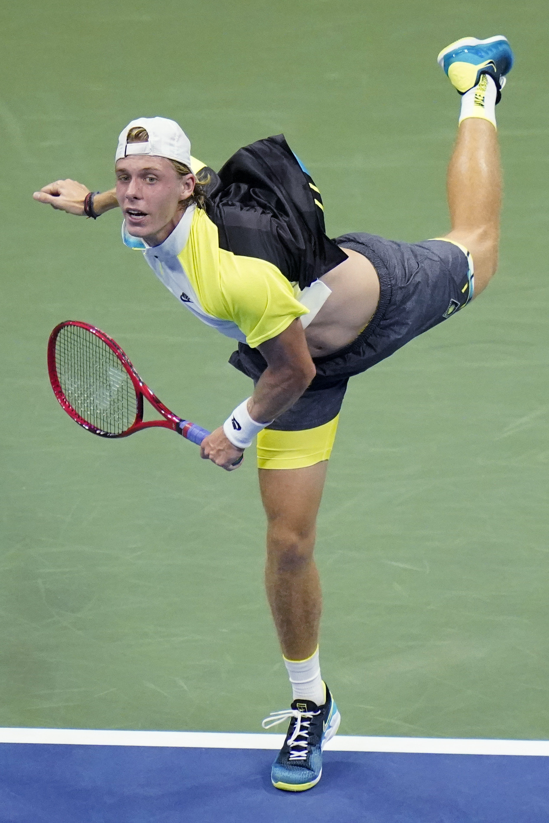 Denis Shapovalov, of Canada, serves to Pablo Carreno Busta, of Spain, during the quarterfinal round of the US Open tennis championships, Tuesday, Sept. 8, 2020, in New York. (AP Photo/Frank Franklin II)